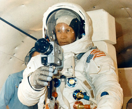 Buzz Aldrin takes a picture with his chest-mounted Hasselblad camera during training.